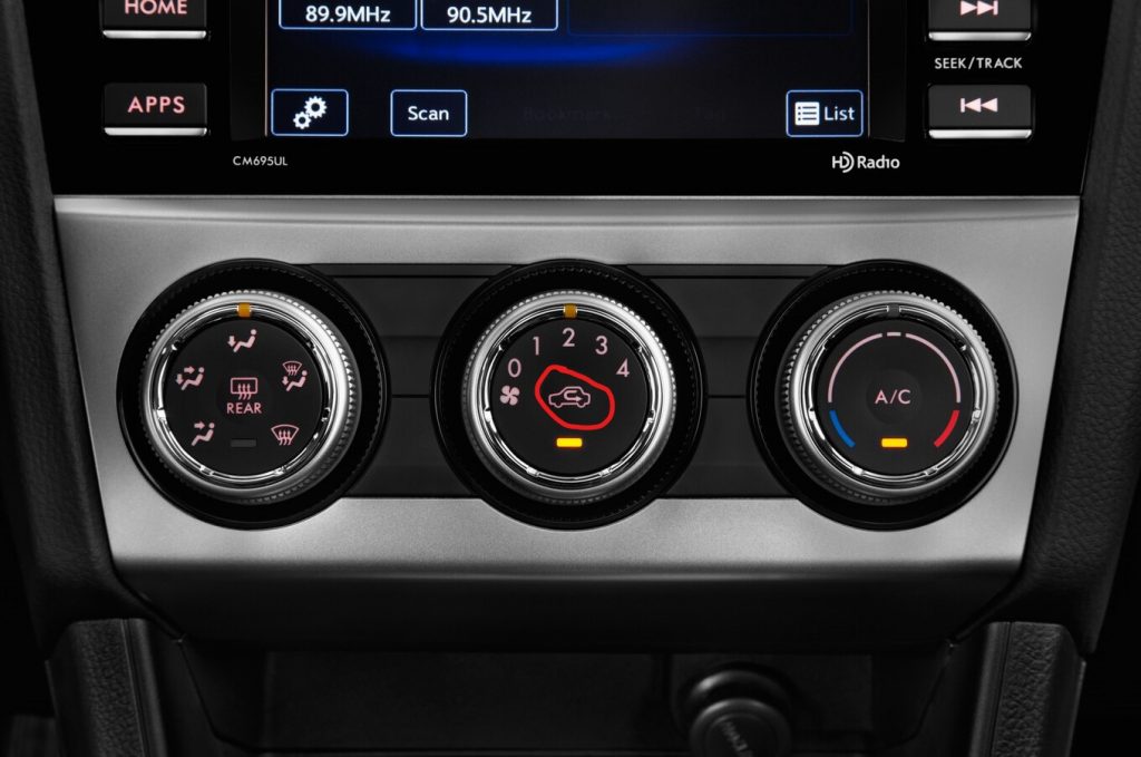 Toyota's air re-circulation button showing a car with a curved arrow